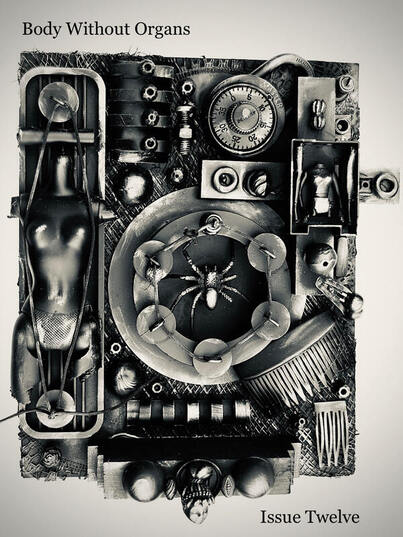 Black and white machine including a lock, mannequin, and fake spider